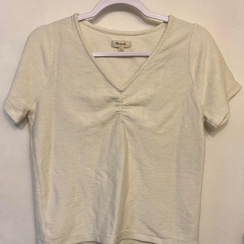 Madewell cream colored top.